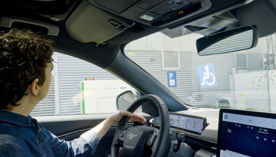 ford is trialling a robot charger to help disabled electric car drivers