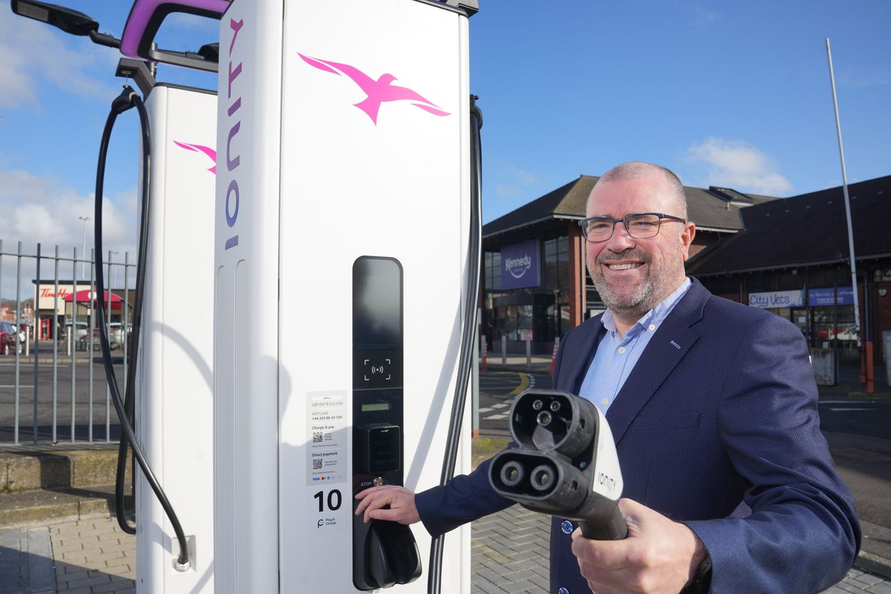 The Kennedy Centre's manager, John Jones, with the new Ionity charging station which has gone live at the retail site. 