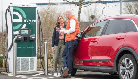 Couple charging at evyve charger