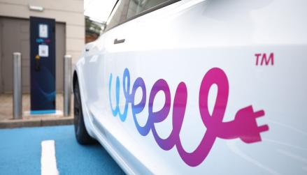 Weev branded car and charge point