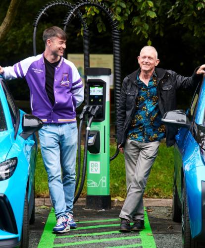 Be.EV launches at Sale watter park - 2 EV's charging with representatives from Be.EV and council stood nearby