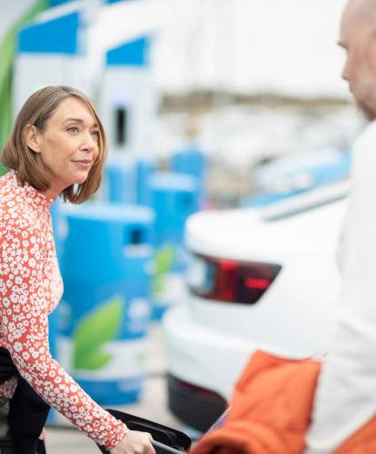 Woman charging EV