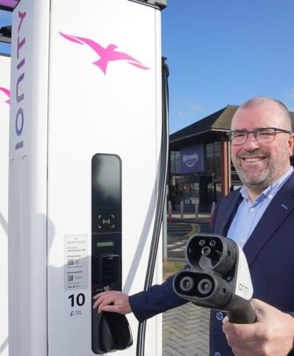 The Kennedy Centre's manager, John Jones, with the new Ionity charging station which has gone live at the retail site. 