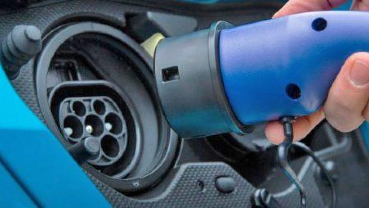 Electric vehicle store charging port