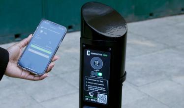 Connected Kerb bollard charge point and Zap-Pay on a mobile phone