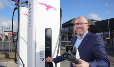 The Kennedy Centre's manager, John Jones, with the new Ionity charging station which has gone live at the retail site. 