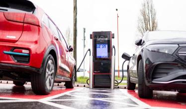 Pogo charge point in use by two EVs