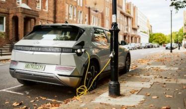 EV parked next to ubitricity on-street lamp post charger